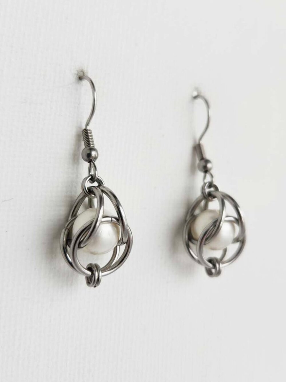 Long silver and pearl earrings